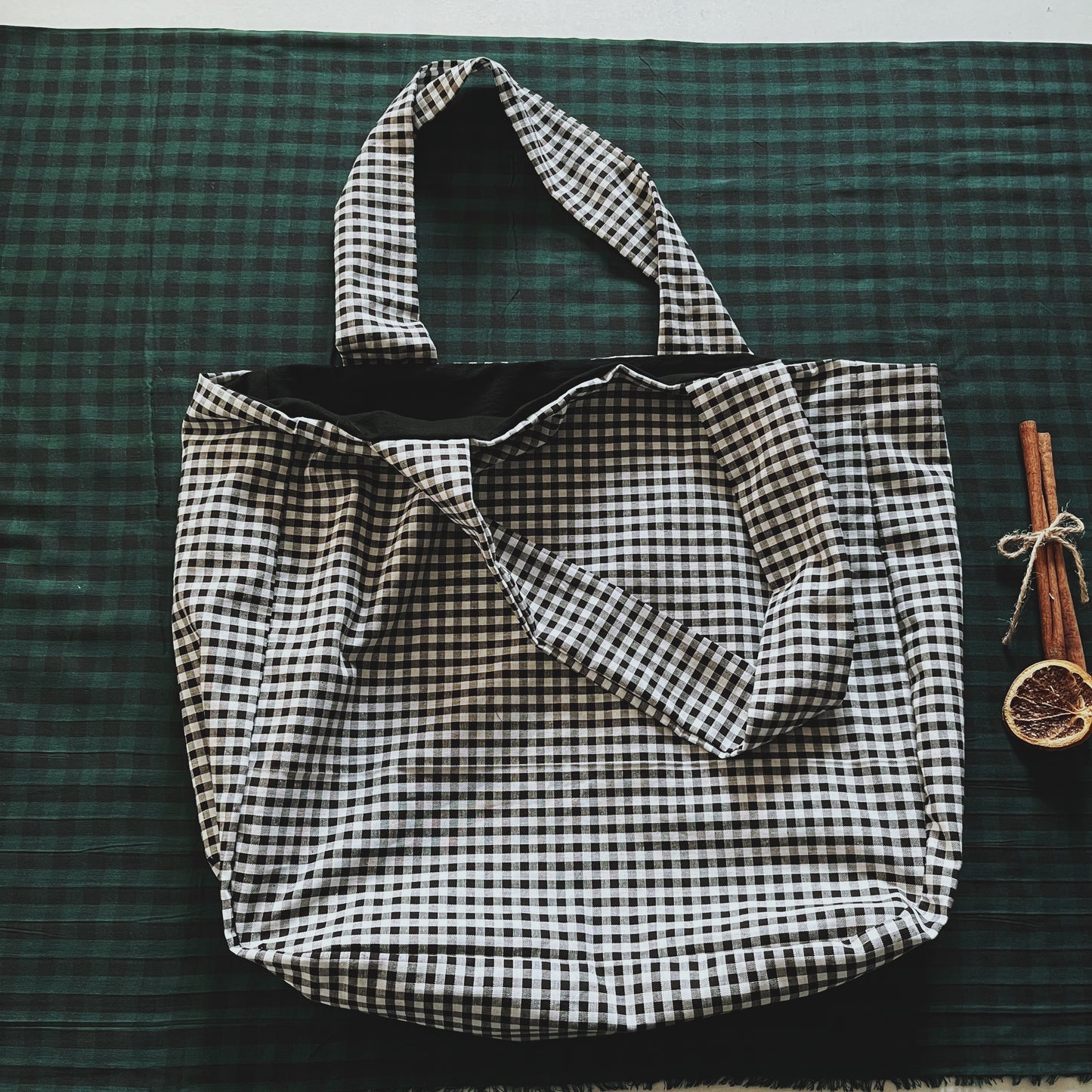 Black and white gingham overnight bag